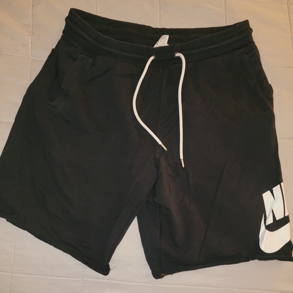 Nike Black Athletic Shorts with White Drawstring and Logo
